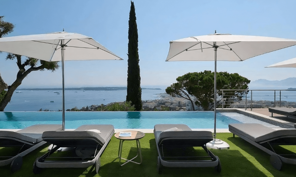 Villa Hotel Bassa Californie in Cannes, French Riviera, France – luxurious marble bathroom with freestanding tub and ambient lighting